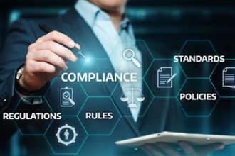 A compliance officer reviews government regulations for an RTO.