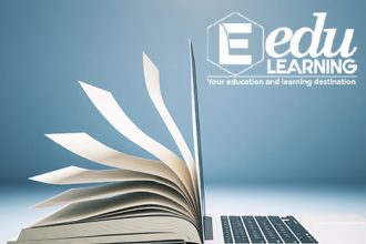 A laptop displaying an open book symbolizes accessible online learning resources for professional development.